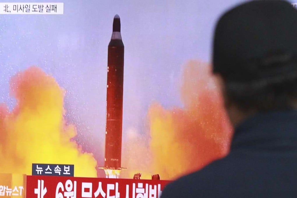 A man watches a TV news programme showing a file image of a missile launch conducted by North Korea, at the Seoul Railway Station in Seoul, South Korea. Photo: AP