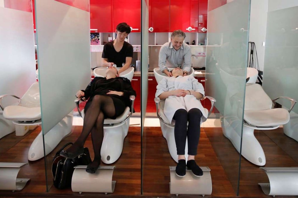 A hair salon in Beijing. In a Pew survey, nine out of 10 people in China describe the economy as being in good shape. Photo: Reuters
