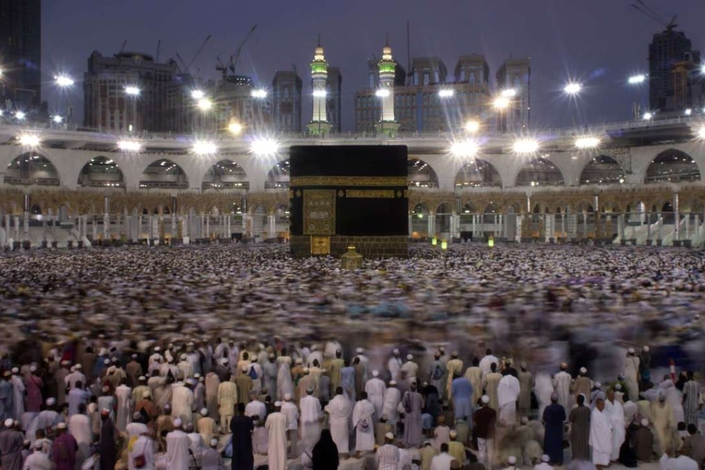 Muslim pilgrims circumambulate the Kaaba, Islam's holiest shrine, the cubic building at the Grand Mosque in the Muslim holy city of Mecca, Saudi Arabia. Photo: AP