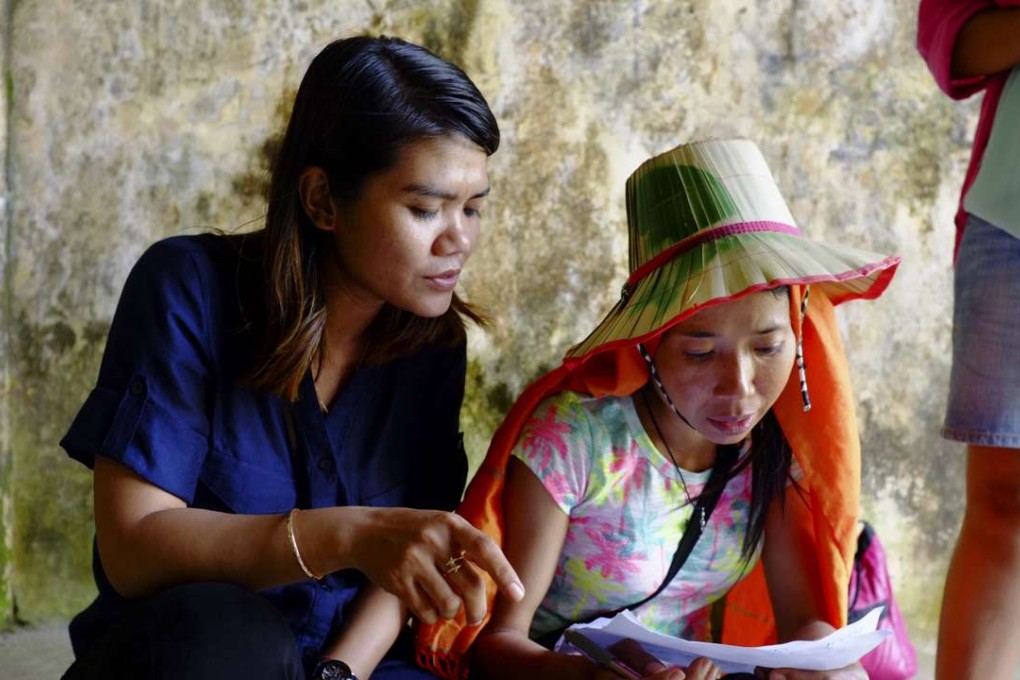Two performers preparing for the Kampot Writers and Readers Festival last year.