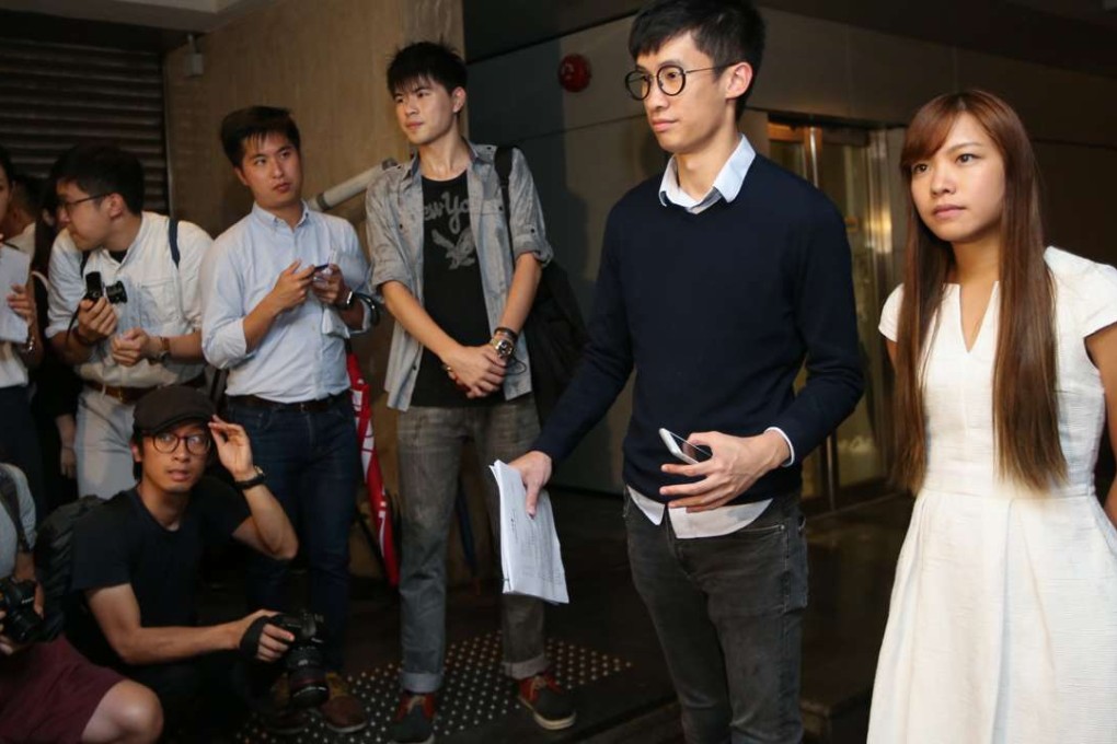 Sixtus Leung and Yau Wai-ching of Youngspiration meet the media outside the High Court. Photo: David Wong