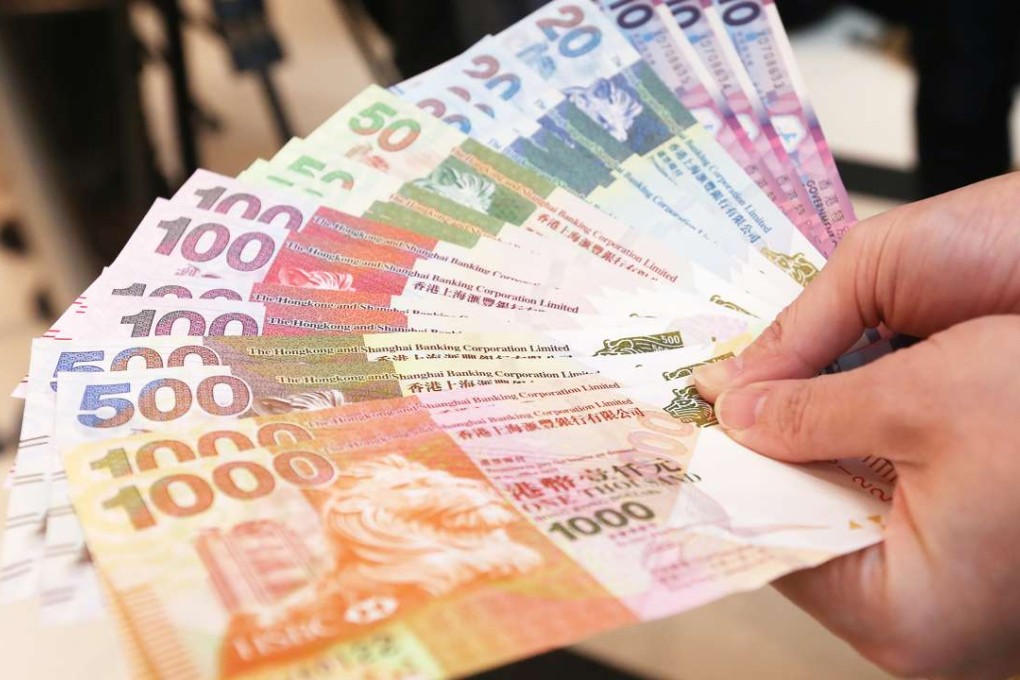 The expected rise in the number of people applying for tax loans is being attributed to companies not paying, or paying less in bonuses this year, a popular way for many to pay their tax. Photo: David Wong