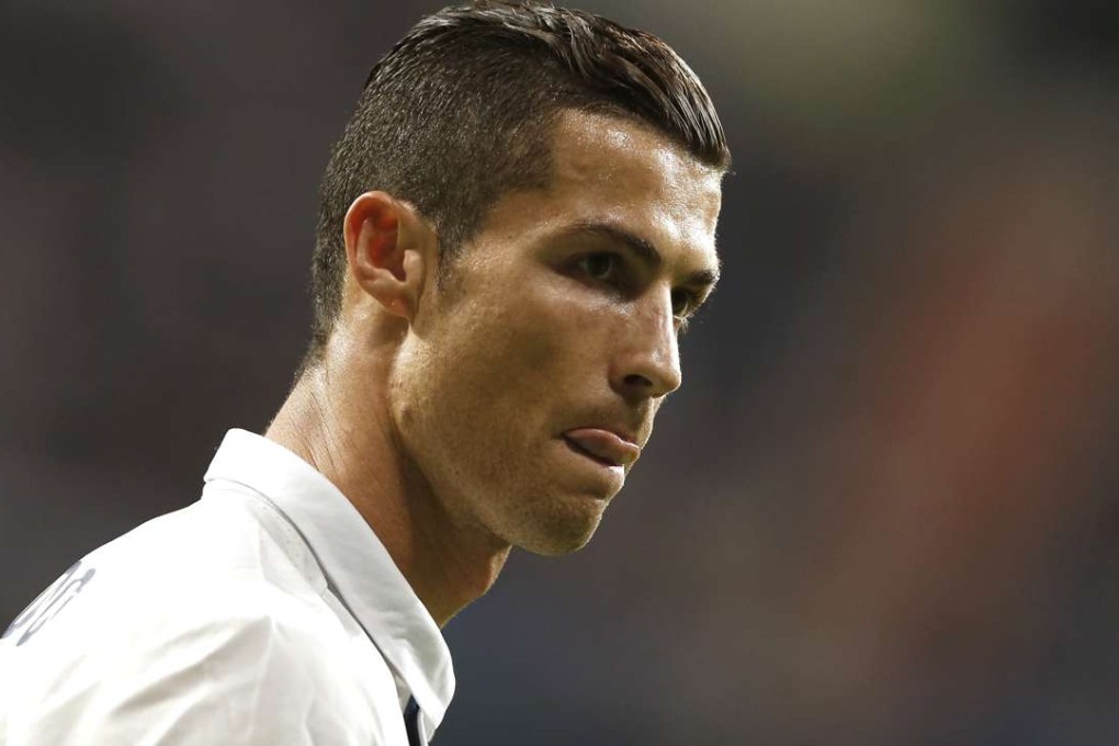 Real Madrid's Cristiano Ronaldo reacts during a Champions League, Group F soccer match between Real Madrid and Legia Warsaw, at the Santiago Bernabeu stadium in Madrid, Tuesday, Oct. 18, 2016. (AP Photo/Daniel Ochoa de Olza)