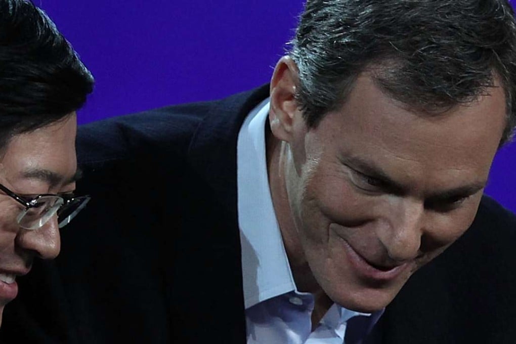 Qualcomm chairman Paul Jacobs (right) has invested in Hong Kong-listed Digital Domain. Photo: AFP