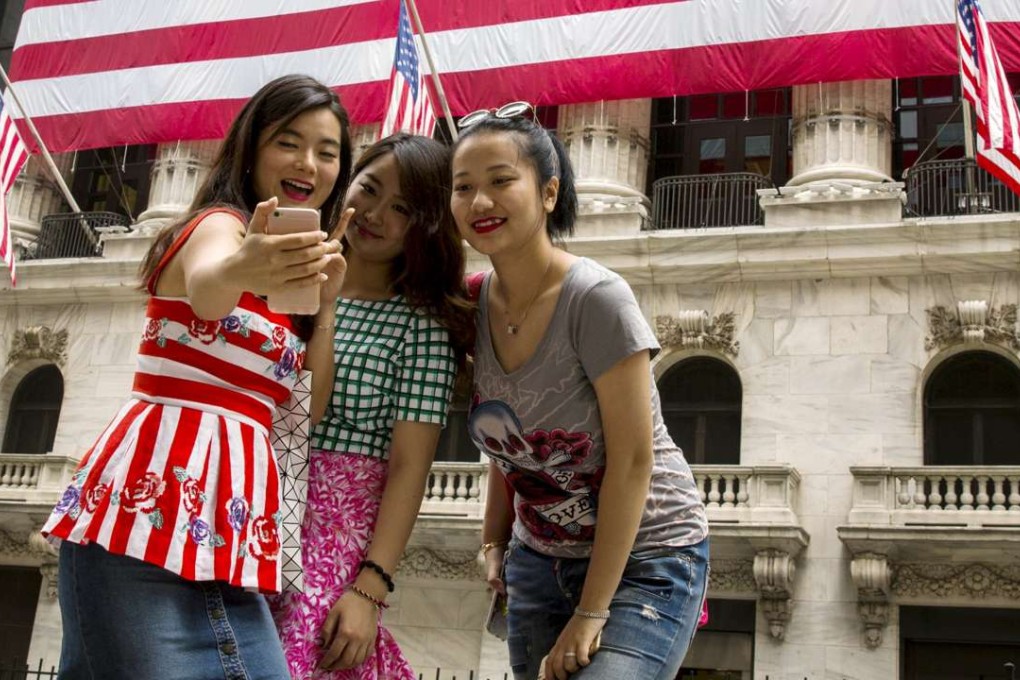 Analysts at New York-based research firm eMarketer have estimated that digital travel sales on the mainland are forecast to reach US$121.98 billion next year, up from an estimated US$95.29 billion this year. Photo: Reuters