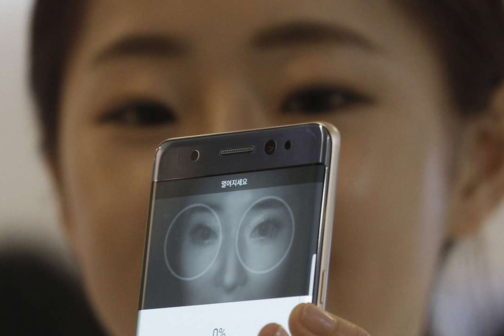 A model demonstrates the iris scanner features of the Galaxy Note 7 during its launch in August. Two months later, the phone has cast a deep shadow on Samsung’s reputation. Photo: AP