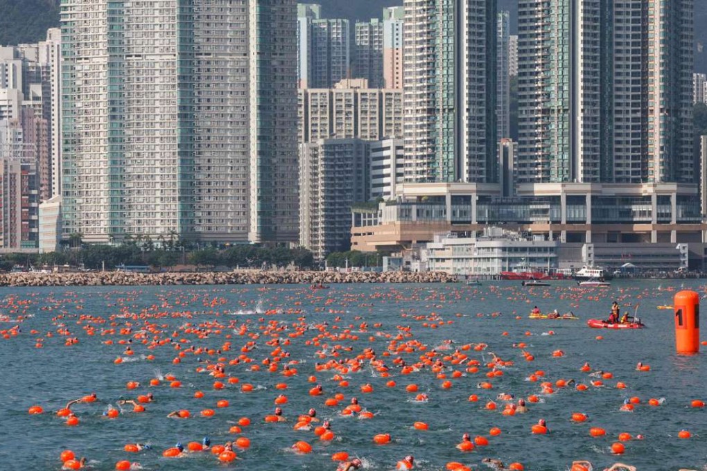 More than 3,000 swimmers take to the waters between Lei Yue Mun and Quarry Bay Park for the annual cross-harbour swim on October 16. Photo: AFP