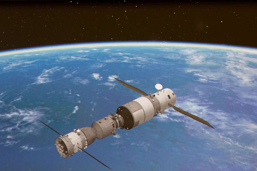 A screen at the Beijing Aerospace Control Centre shows a simulated picture of the automated docking between the Shenzhou-11 manned spacecraft and the orbiting space lab Tiangong-2. Photo: Xinhua