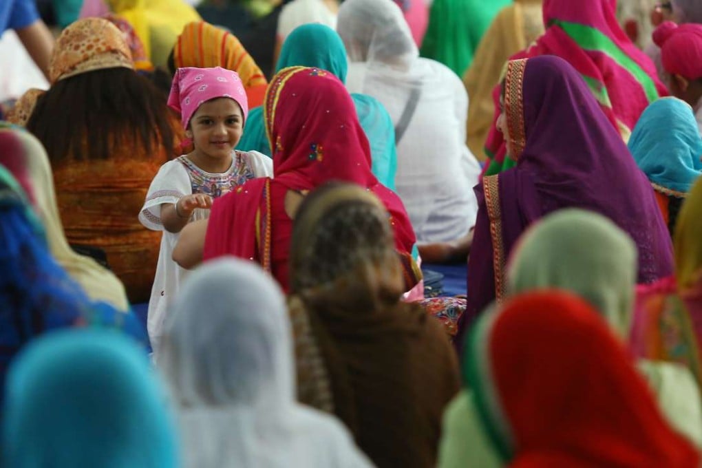 Members of Hong Kong’s Sikh community at their gurdwara in Wan Chai. Photo: Edmond So