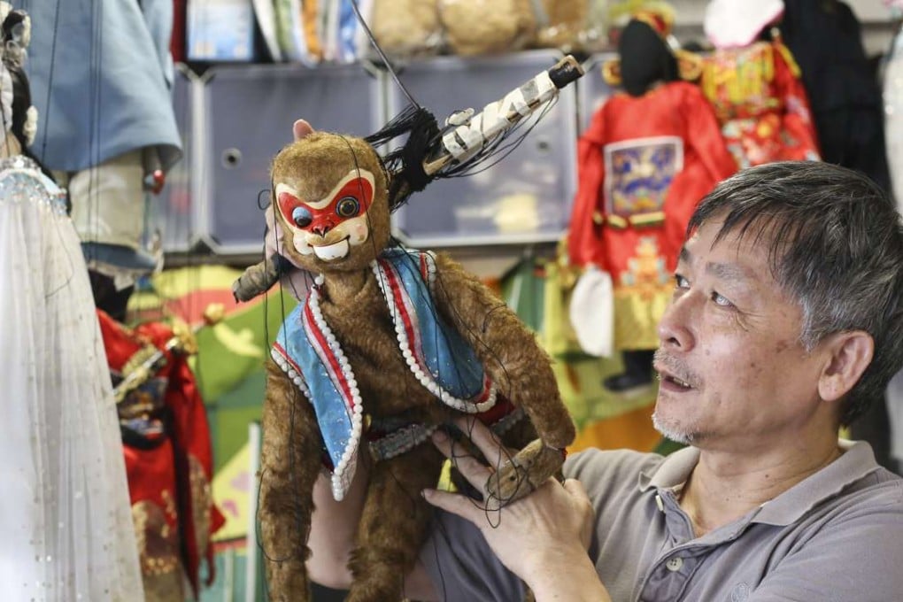 Master puppeteer Wong Fai with a monkey puppet. Photo: Rachel Cheung