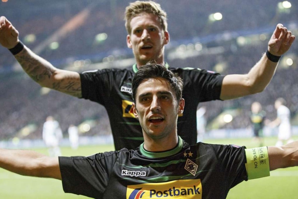 Moenchengladbach's Lars Stindl (front) celebrates with Andre Hahn (back) after scoring the 0-1 opening goal during the UEFA Champions League Group C match between Celtic Glasgow and Borussia Moenchengladbach, in Glasgow, Scotland, Britain, 19 October 2016. EPA/ROBERT PERRY