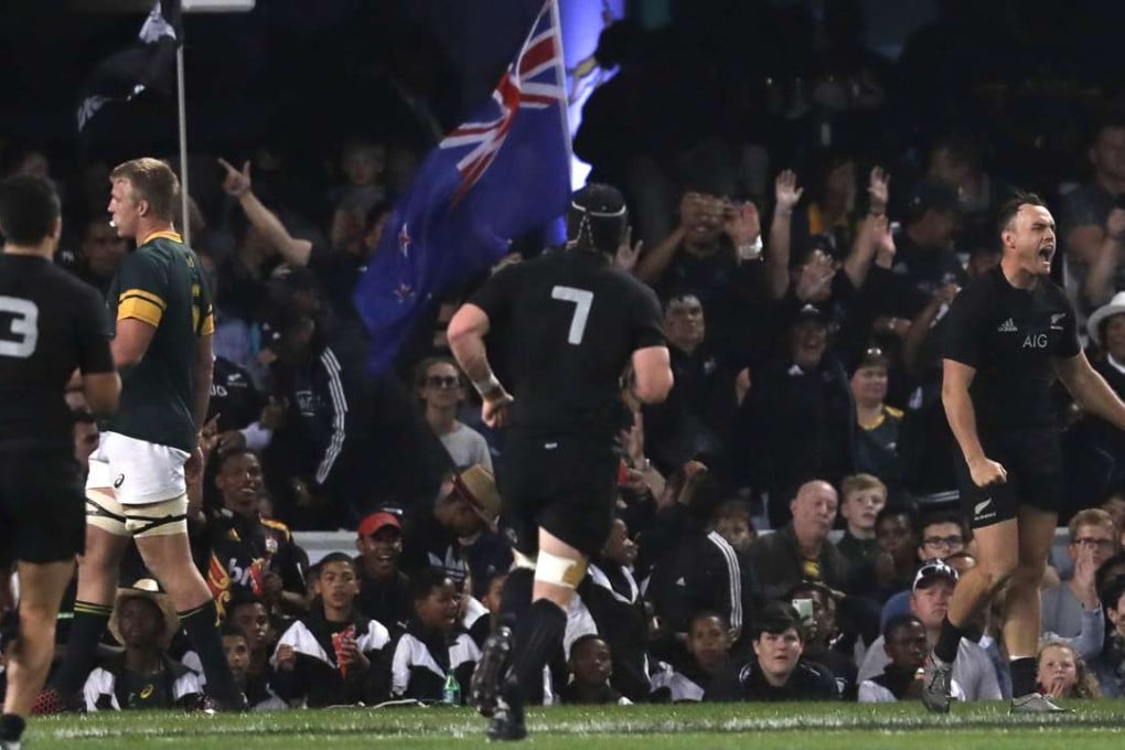 New Zealand’s Israel Dagg (R), reacts after scoring a try during the rugby championship match between South Africa and New Zealand. Photo: AP