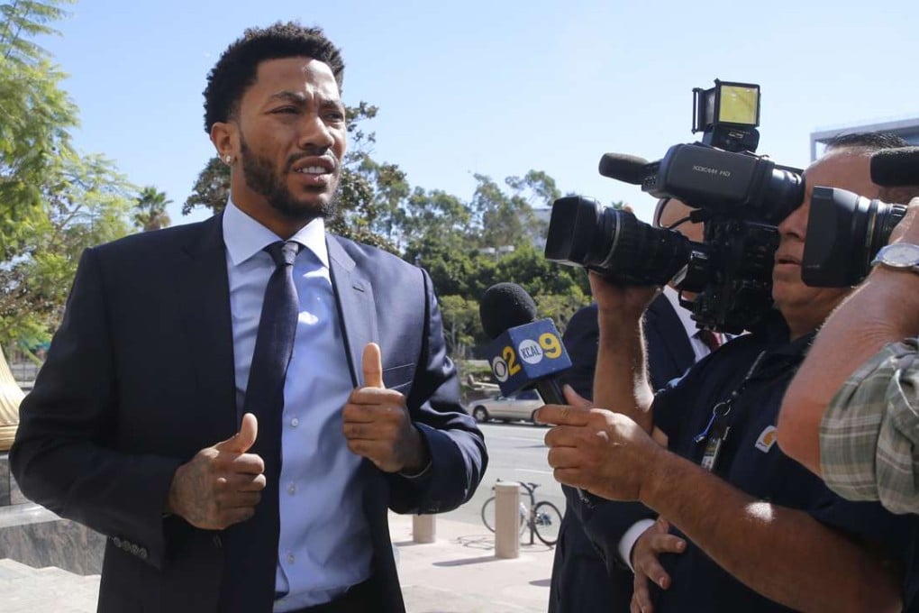 New York Knicks basketball player Derrick Rose arrives at U.S. District Court in downtown Los Angeles on Thursday, Oct. 6, 2016. A six-woman, two-man jury has been seated in the trial of a civil lawsuit brought against Derrick Rose by an ex-girlfriend who alleges the NBA star and two of his friends drugged and sexually assaulted her. (AP Photo/Damian Dovarganes)