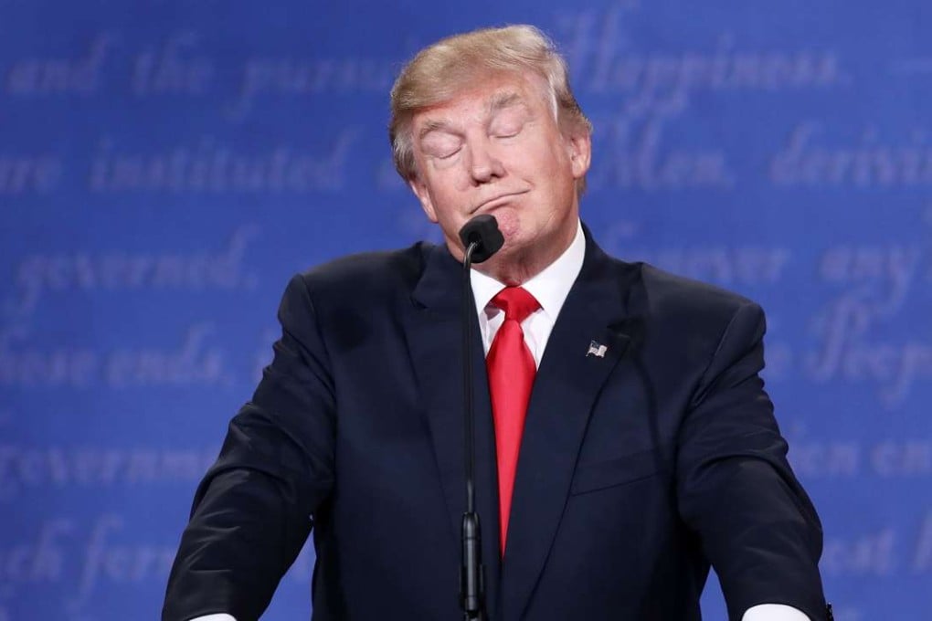 Republican presidential nominee Donald Trump gestures as he speaks during the third US presidential debate. Photo: AP