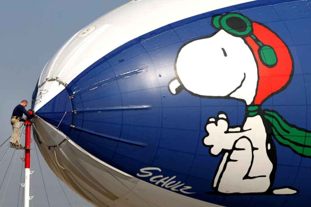 The MetLife blimp and Snoopy gets ready to pull the pin on the airship at Bakersfield, California. Photo: AP