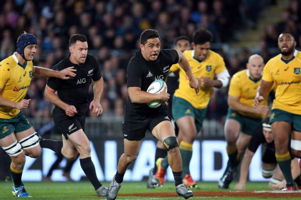 New Zealand's Anton Lienert-Brown breaks the defence open. Photos: AFP