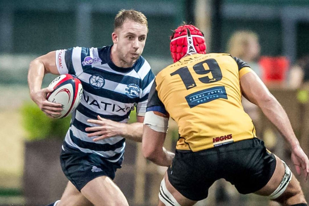 Hong Kong Football Club recruit Tom Isaacs hunts for a way through the Tigers defence. Photos: SCMP Pictures