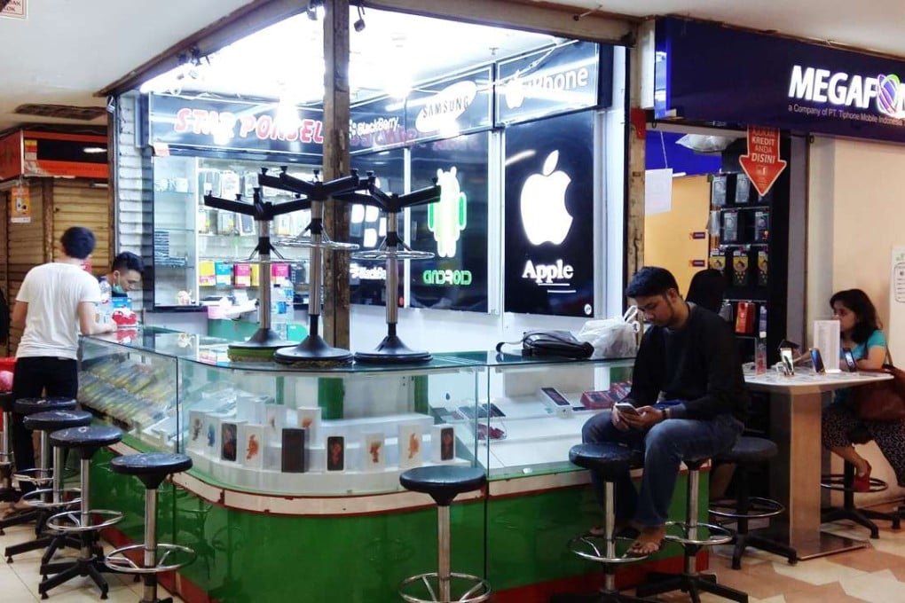 A phone shop at a shopping centre in Jakarta. Photo: AFP
