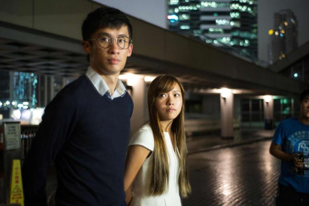 Localists Baggio Leung (left) and Yau Wai-ching’s actions when they took their Legislative Council oaths prompted the latest debate about separation of powers. Photo: AFP