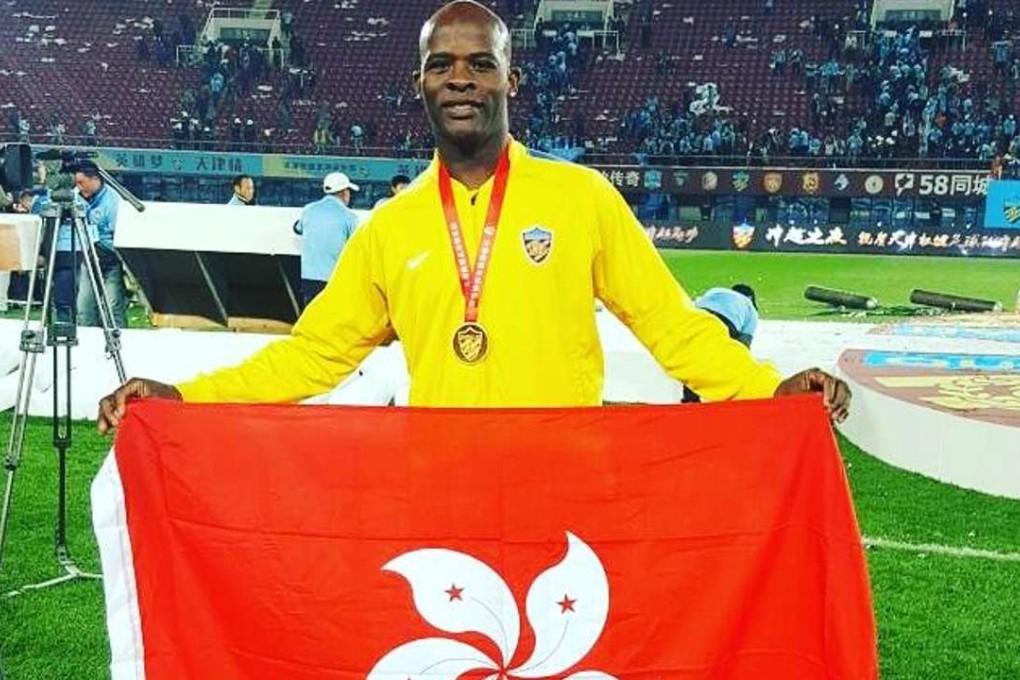 Jean Kilama flies the Bauhinia flag