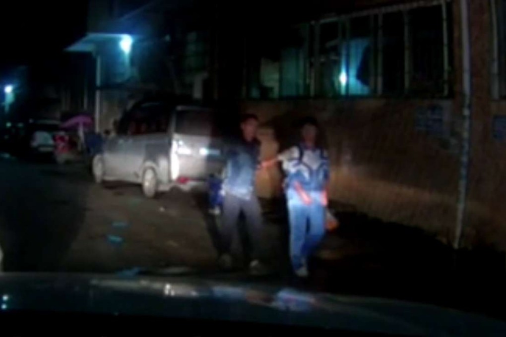 A picture of the girl circulated on social media showing her held by another man. Photo: SCMP Pictures