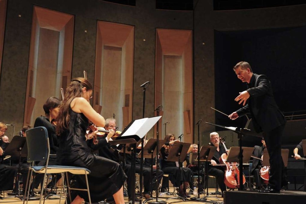Matthias Pintscher directs the Ensemble Intercontemporain. Photo: Luc Hossepied