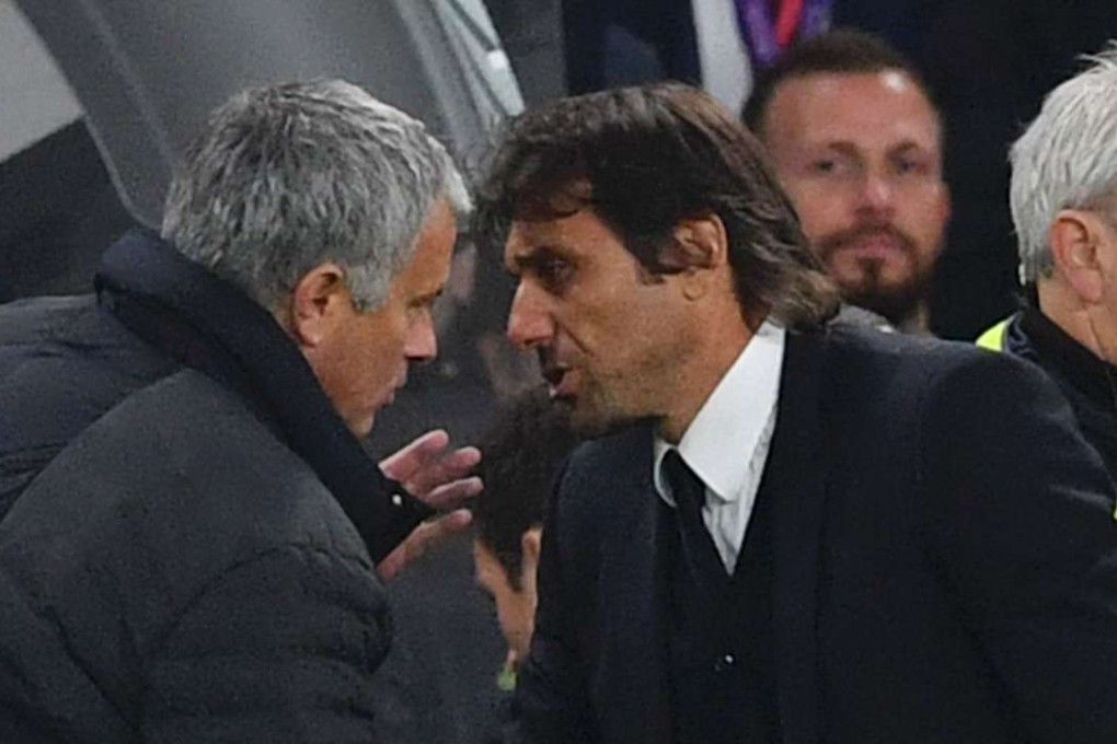 Chelsea head coach Antonio Conte in discussion with Manchester United manager Jose Mourinho after the final whistle. Photo: AFP