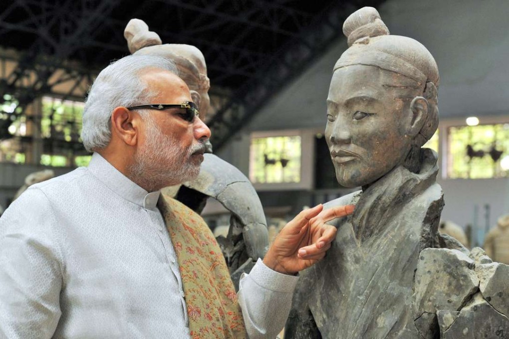 India’s Prime Minister Narendra Modi looking at a terracotta warrior on his China trip. Photo: SCMP Pictures