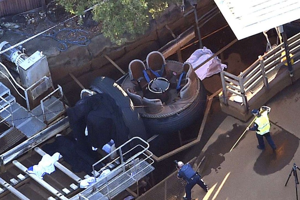 Four people died after a malfunction caused two people to be ejected from their raft, while two others were caught inside the ride at the popular theme park. Photo: AP