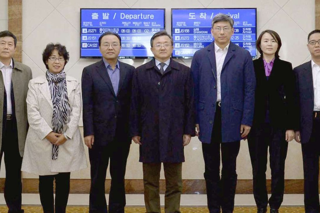 China’s Deputy Foreign Minister Liu Zhenmin (centre) poses for a photo in Pyongyang, North Korea, upon his arrival at the airport on Monday. Photo: Kyodo