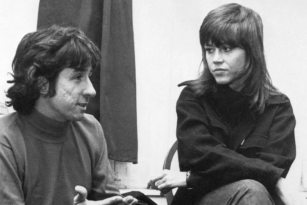 In this 1972 file photo, actress Jane Fonda and Tom Hayden talk at the home of a friend in London. Photo: AP
