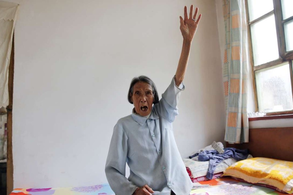 Chinese former ‘comfort woman’ Ren Lane speaks about her experience at her home in Shanxi province last year. Ren died on July 1. Photo: Reuters
