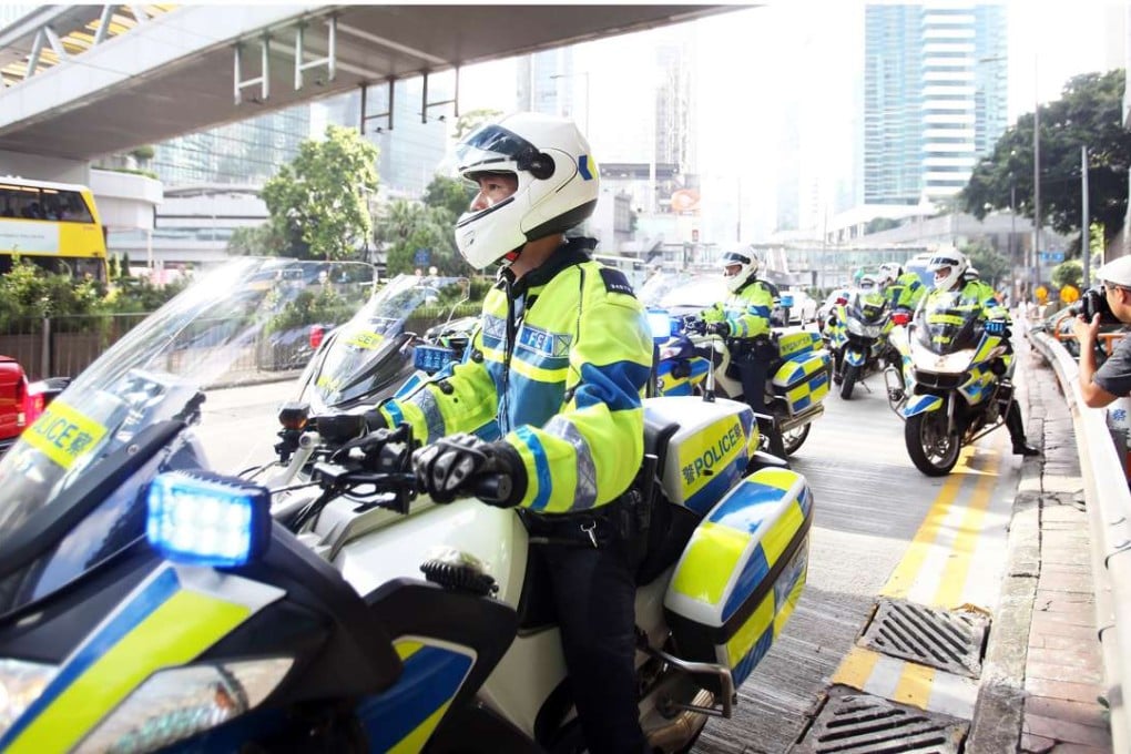 A police escort for Rurik Jutting on the third day of his trial. Photo: Xiaomei Chen