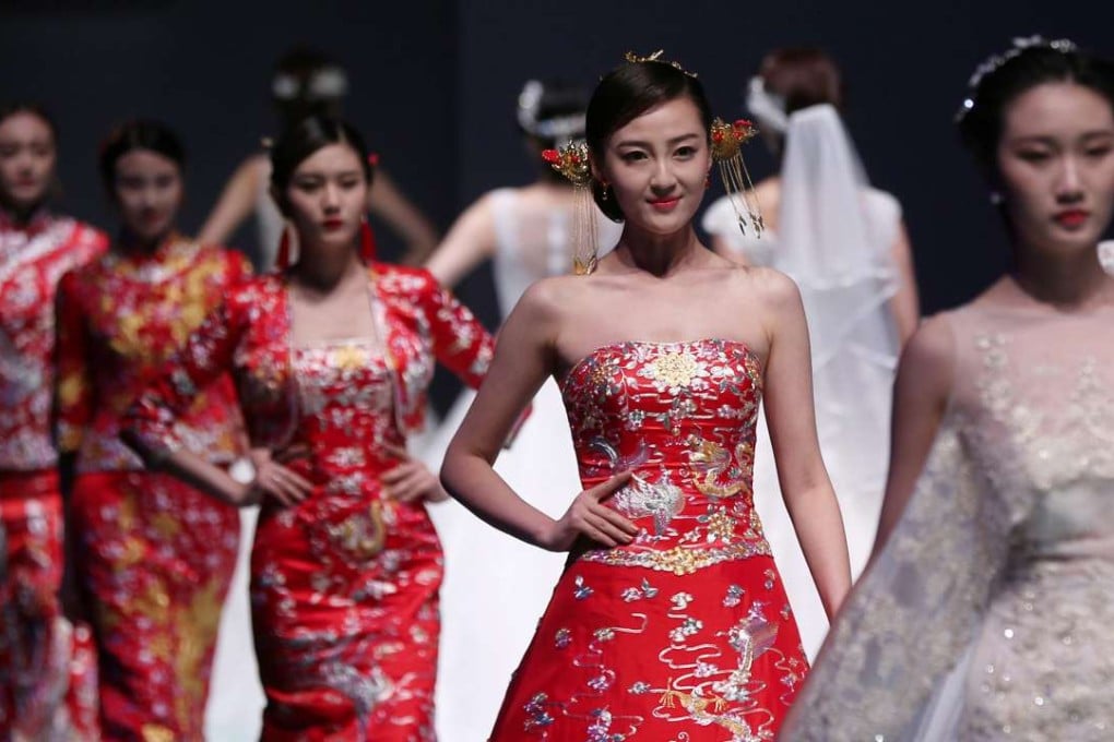Models present creations from the Famory Collection by designer Cai Zhonghan during China Fashion Week in Beijing. Photo: EPA