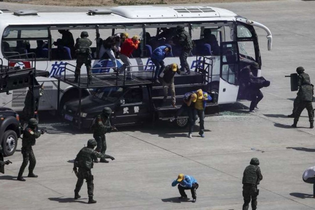 A file picture of Chinese commandos taking part in an anti-terrorism training exercise in Beijing in 2014 simulating a bus hijacking. Photo: Reuters
