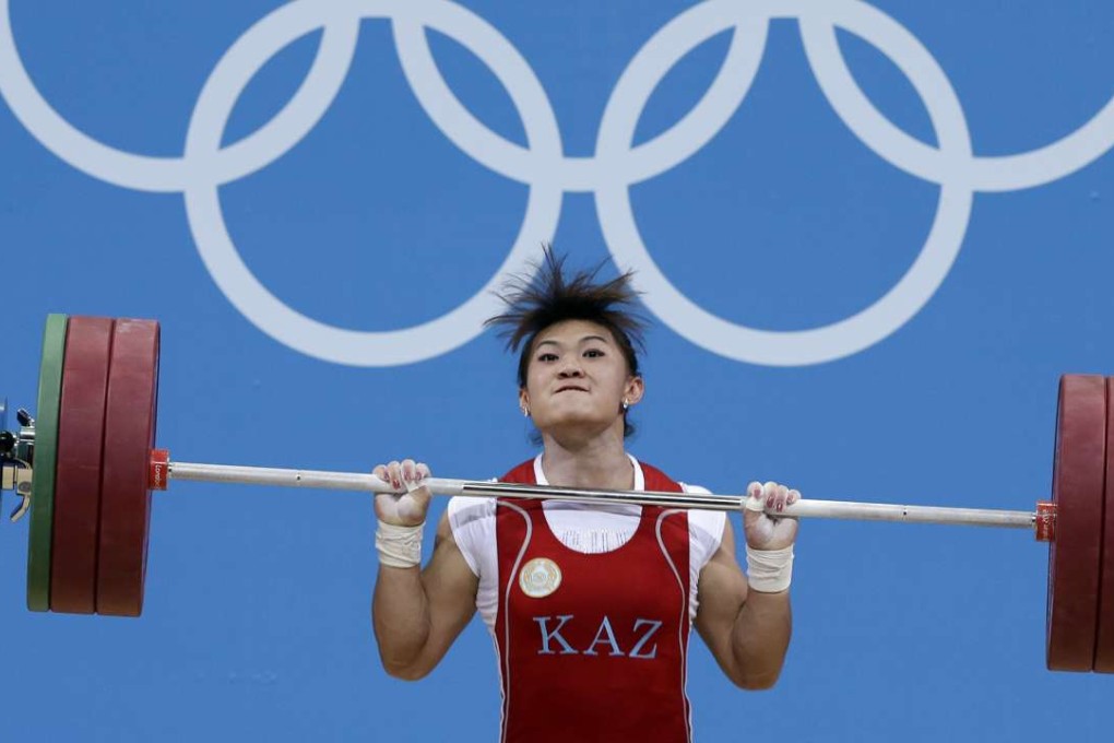 Kazakhstan’s Maiya Maneza competes during the women's 63kg weightlifting competition at the 2012 London Olympics. Photos: AP