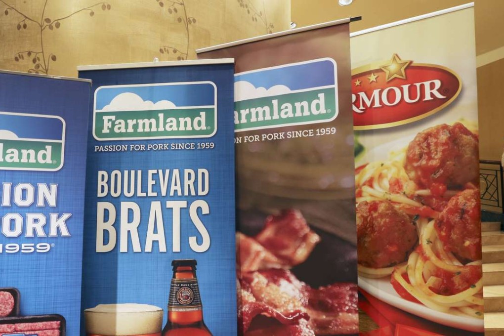 Posters show products made by WH Group. Its shares plunged the most in more than two years on Friday morning after a major shareholder planned to reduce its stake. Photo: David Wong