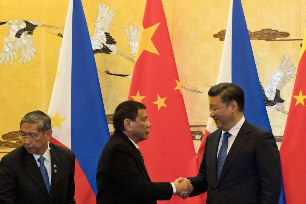 Philippine President Rodrigo Duterte shakes hands with Chinese counterpart Xi Jinping during his visit to Beijing. Photo: AFP