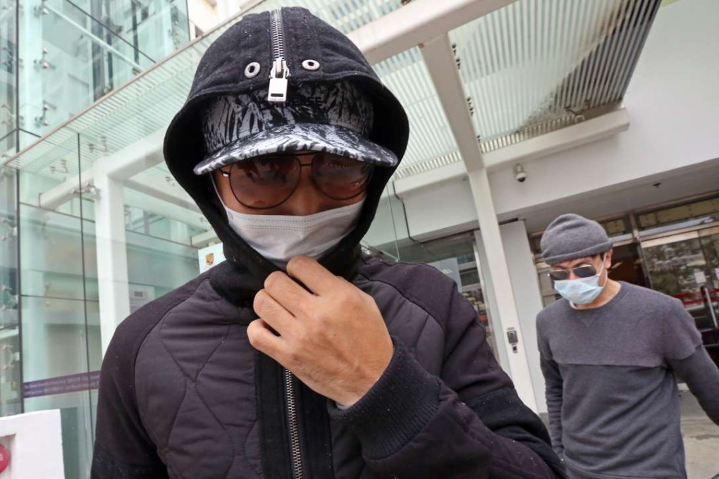 Hong Kong Uber drivers Luk Chun-pong and Chan Kin-fung, who have been charged with driving without a permit or third-party insurance, at Kowloon City Court. Photo: Nora Tam