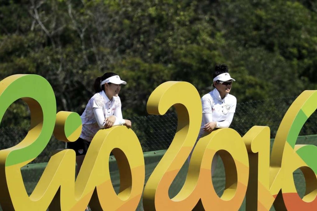 Athletes posing for the Rio Olympics logo. Photo: AP