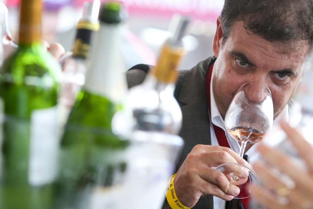Visitors enjoy the Hong Kong Wine and Dine Festival on the Central harbourfront, which is expected to pull in 150,000 people. Photo: Dickson Lee