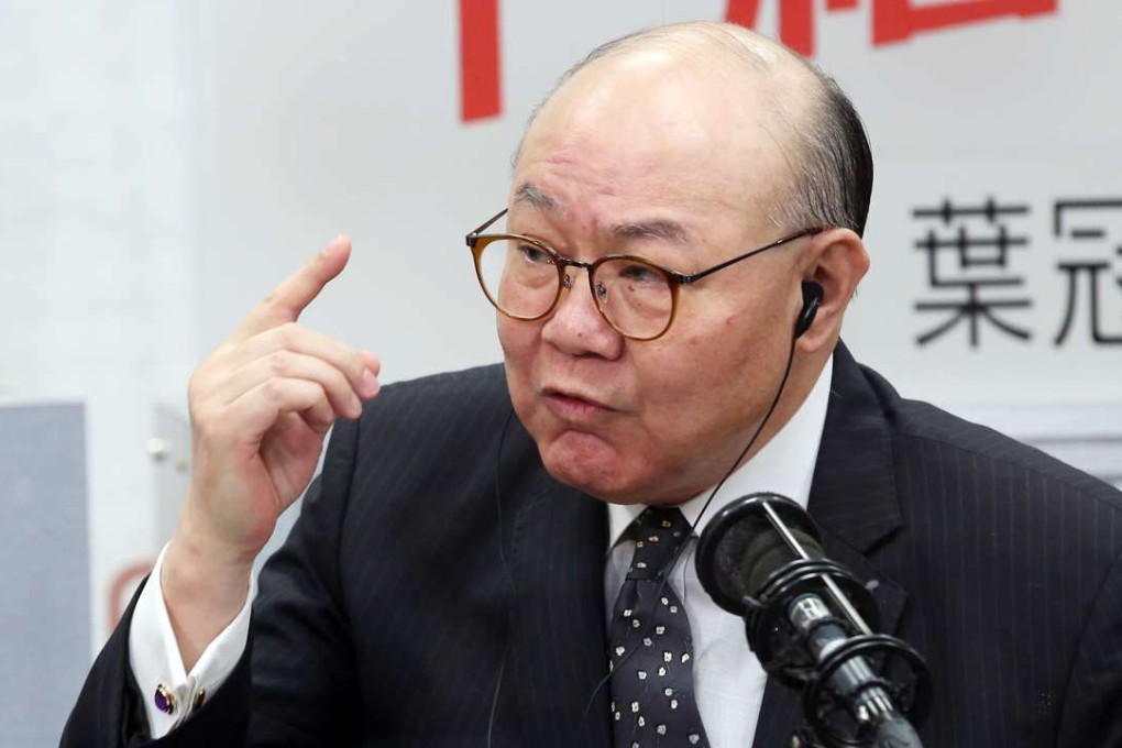 Retired judge Woo Kwok-hing appearing on a radio programme at Commercial Radio in Kowloon Tong on Friday. Photo: Edward Wong