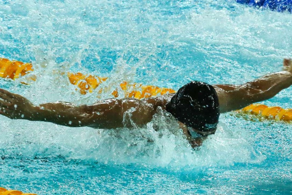 Hong Kong’s Kenneth To King-him in the men's 50m butterfly of the World Cup at Victoria Park. Photo: Edward Wong