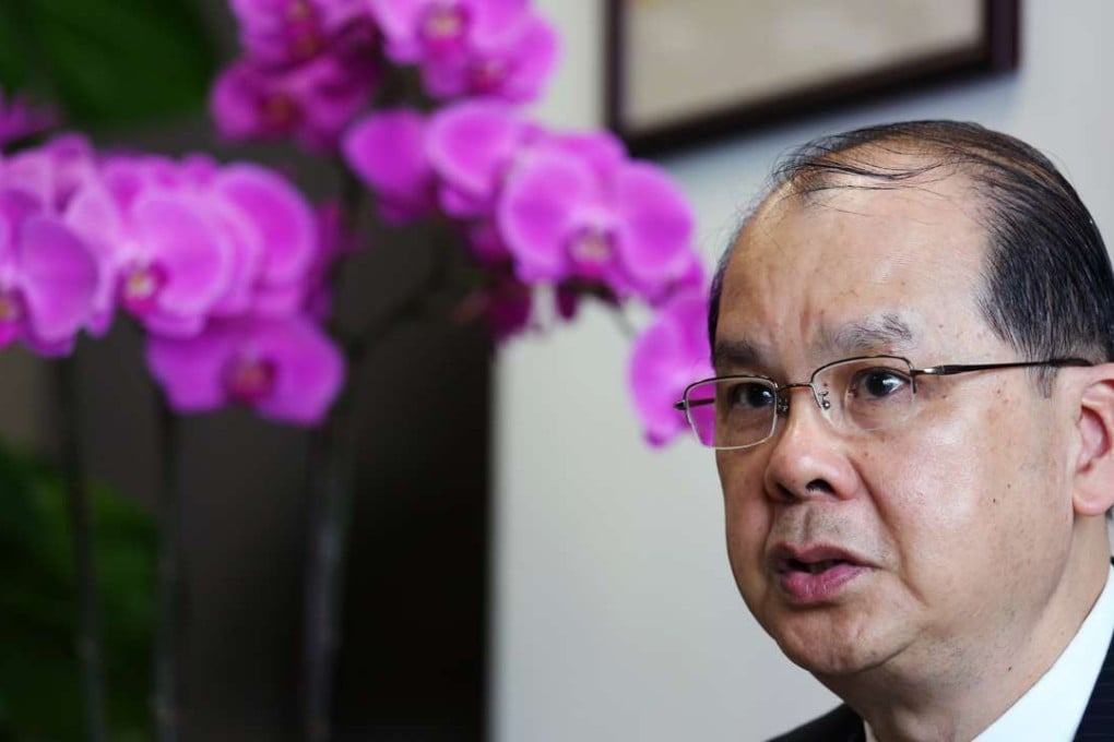 Labour minister Matthew Cheung clarifies the new rules on cleaning windows. Photo: Nora Tam