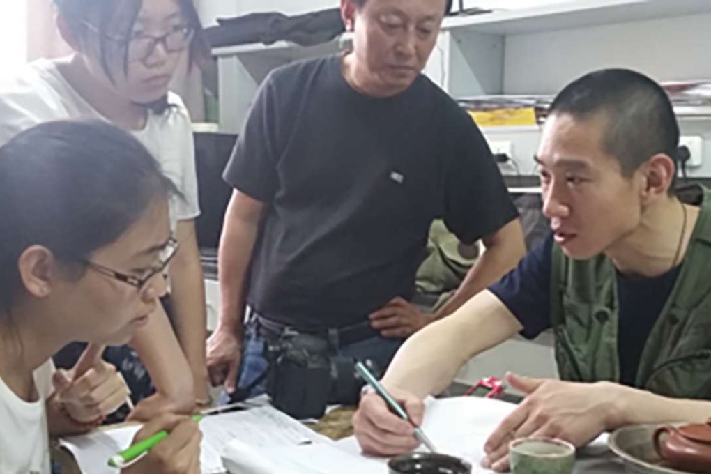Han Chunyu (right) discussing his findings with journalists. Photo: SCMP Pictures