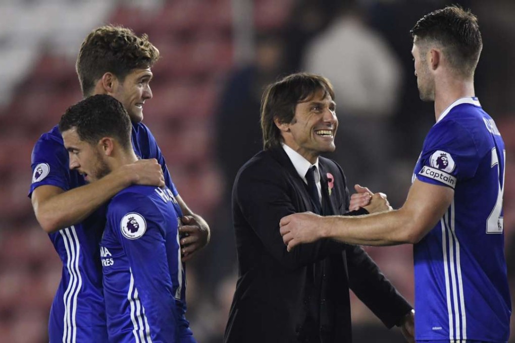 Chelsea manager Antonio Conte celebrates after the 2-0 win over Southampton with captain Gary Cahill, Eden Hazard and Marcos Alonso. Photo: Reuters