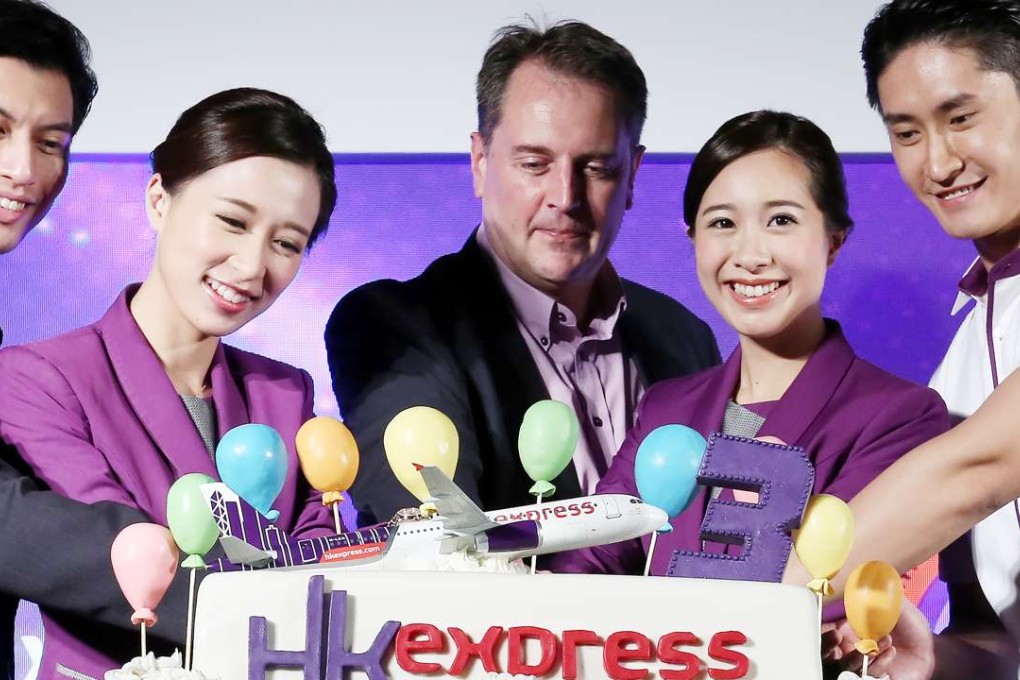 Andrew Cowen (centre), marks the firm’s birthday. Photo: Jonathan Wong