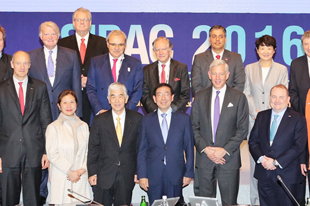 Members of the Seoul International Business Advisory Council pose for a photo during their meeting at City Hall, Friday. Photo: Seoul Metropolitan Government