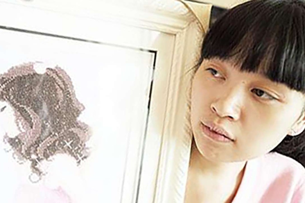 Liang Juan, 21, has spent her whole life inside the family home. Photo: SCMP Pictures
