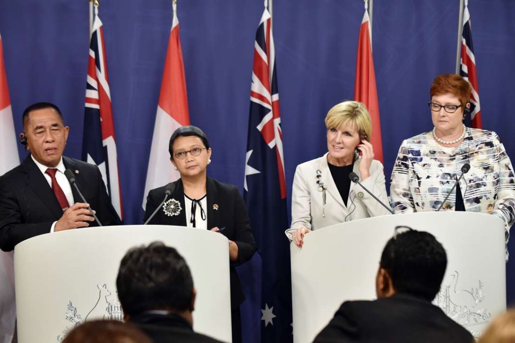 Indonesia’s Defence Minister Ryamizard Ryacudu, Indonesia's Foreign Minister Retno Marsudi, Australia's Foreign Minister Julie Bishop and Australia's Defence Minister Marise Payne. Photo: AFP